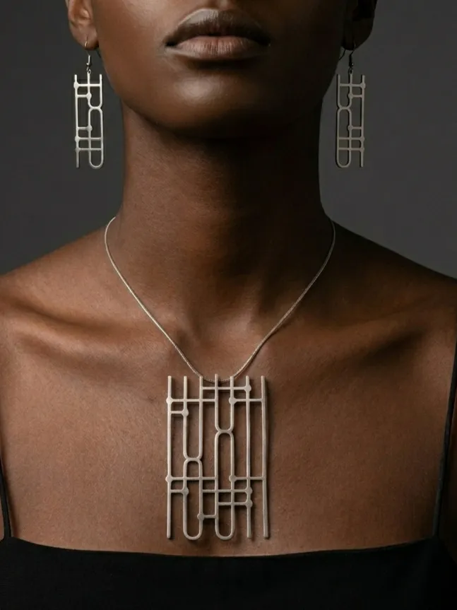 Quantum Earrings and Necklace pendant worn, stainless steel